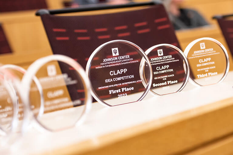 Clapp Idea Competition glass awards on a table