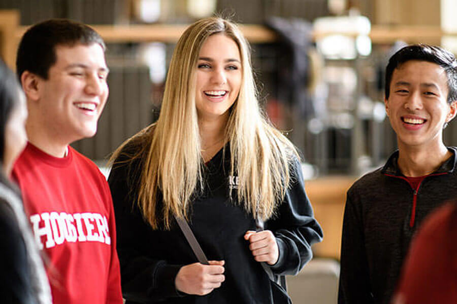 Smiling students inside Hodge Hall