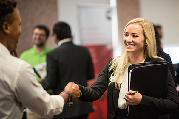 Female student at a networking event