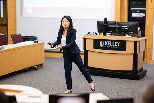 A Kelley faculty member leads a class session of master's in management graduate business students. 