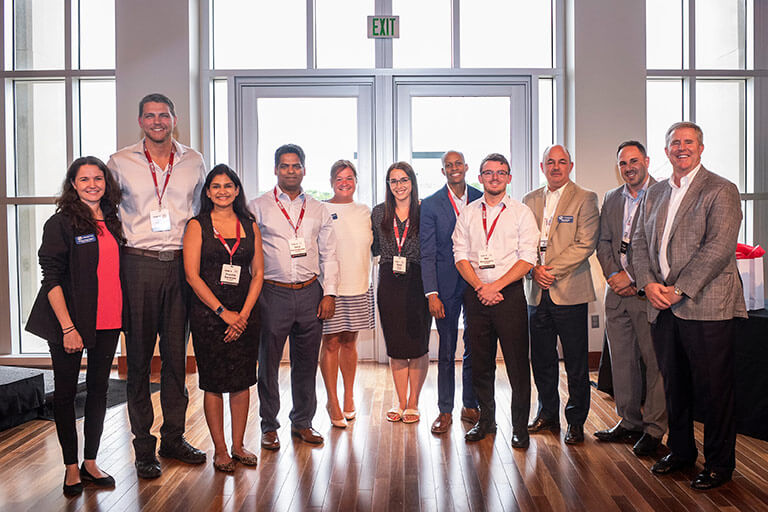Kelley Direct students and faculty at an on-campus event. Online MS in Strategic Management students learn from the same faculty who teach in Kelley’s in-residence programs. 
