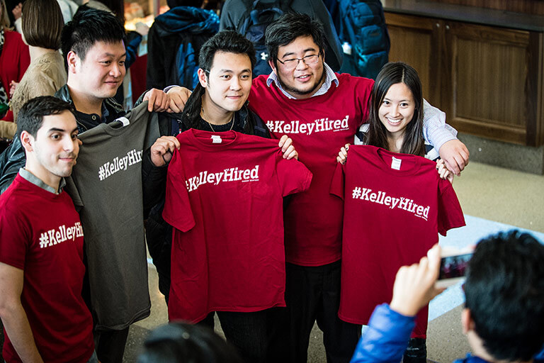 Students pose with Kelley Hired shirts