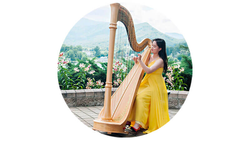 Cindy Lee playing the harp