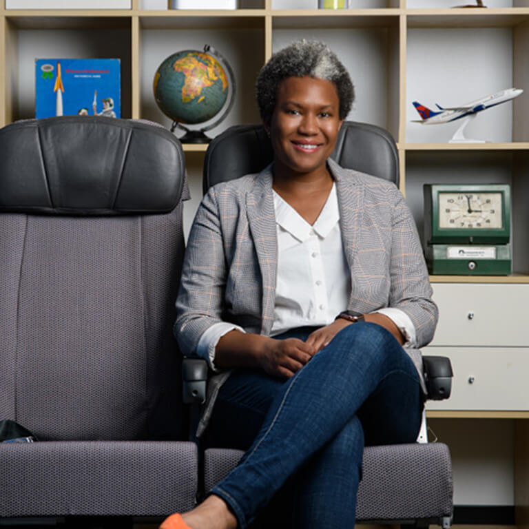 Joy Martin seated in her office